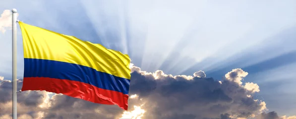 Fototapeten Colombia flag on blue sky. 3d illustration © viperagp
