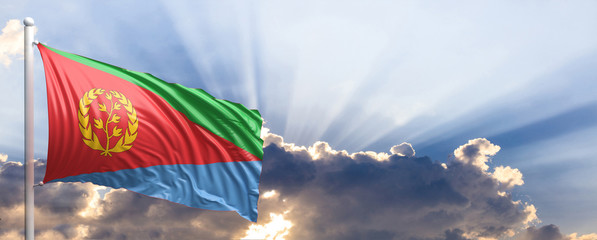 Eritrea flag on blue sky. 3d illustration