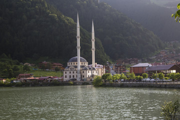 One of the most beautiful tourist places in Turkey. Uzungol - a mountain valley with a trout lake and a small village.