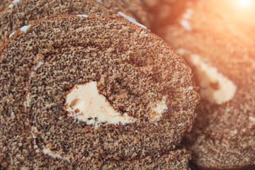 Delicious sweet roll with cream close-up. Cookies.