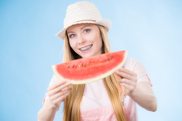 Happy woman holding watermelong