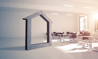 Conceptual background image of concrete home sign in modern offi