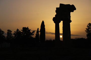 Temple of Castor and Pollux in Valley of the Temples of Agrigento during sunset, Sicily, Italy