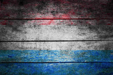 wooden texture surface with old painted flag