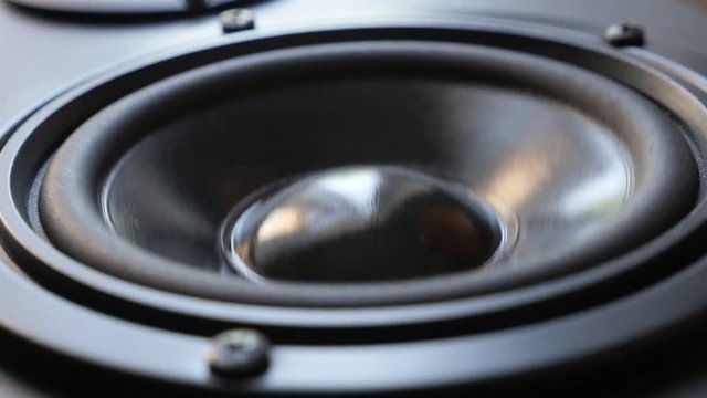 Low frequency sound on music device diaphragm slow-mo 