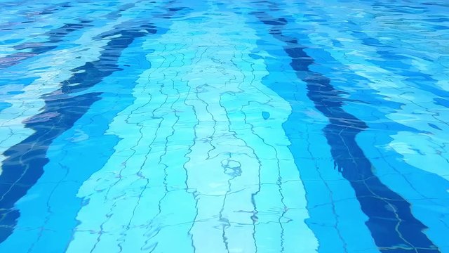 Blue rippled water in the swimming pool