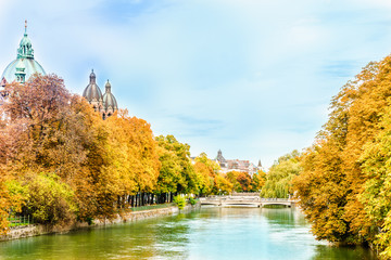 View on colorful trees at the Isar in Autumn in Munich