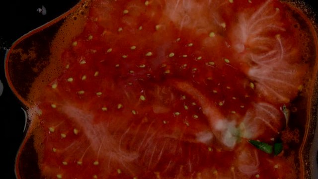 Strawberry's falling and squashing in slow motion