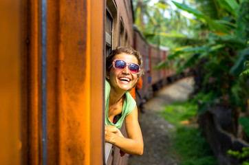 Young woman traveling by train