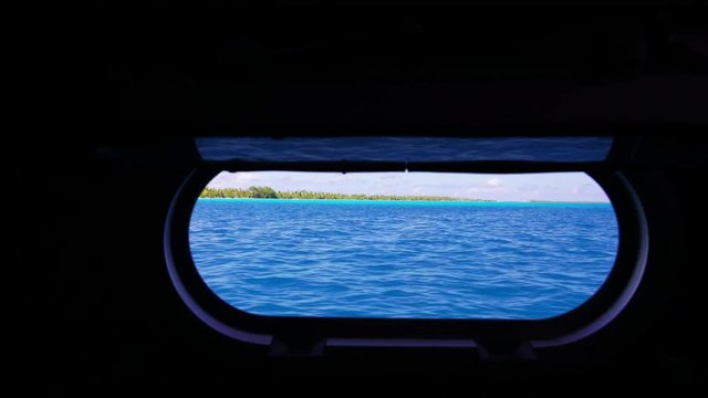 POV, inside boat off coast of French Polynesia