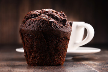 Composition with cup of coffee and muffin