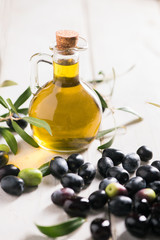 Olives And Olive Oil In a Bottle