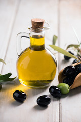 Olives And Olive Oil In a Bottle