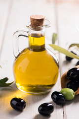 Olives And Olive Oil In a Bottle