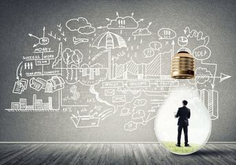 Businessman trapped in bulb