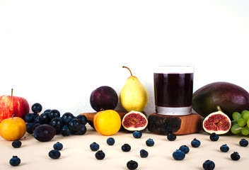 Grape juice with autumn seasonal fruits.