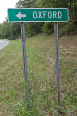 Highway sign with arrow directing traffic to Oxford, Alabama, USA