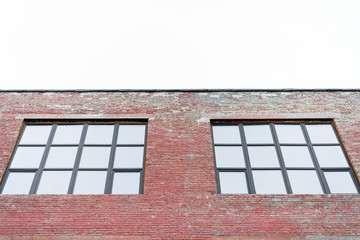 facade of the building with large square windows