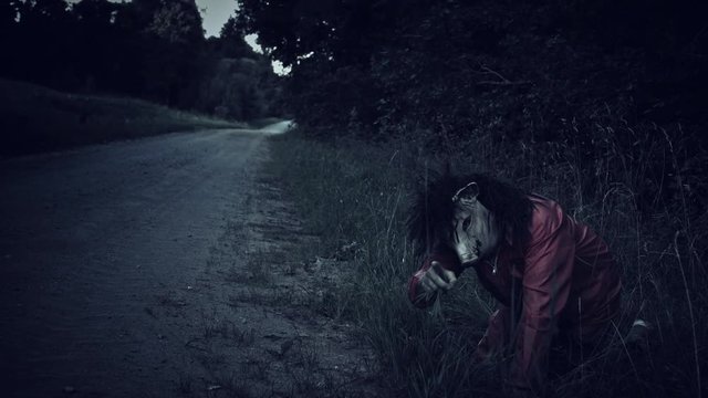 4K Halloween Horror Man with Pig Mask Crawling