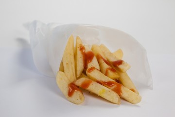 French fried chips on table