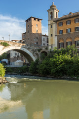 Fototapeta na wymiar Amazing view of Castello Caetani, Tiber River and Pons Fabricius in city of Rome, Italy