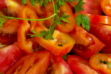 The background consists of large sliced ​​vegetables.