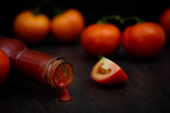 Still life of fresh ripe tomatoes sauce