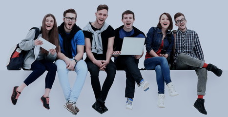 Causal group of people sitting on the floor isolated