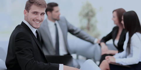 Group of business partners discussing ideas with their leader on