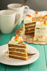 Piece of carrot cake with cream cheese frosting