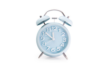 Business and Financial Concept.Twin bell analog alarm clock with stacks of coins and space for your...