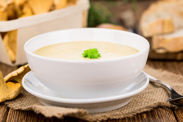Creamy Chanterelle Soup close-up shot, selective focus