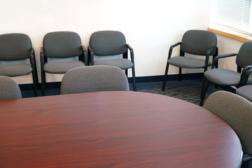 Close up on meeting room with meeting table and chairs