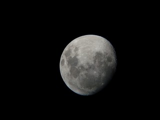 Obraz na płótnie Canvas moon viewed through an amateur astronomer telescope