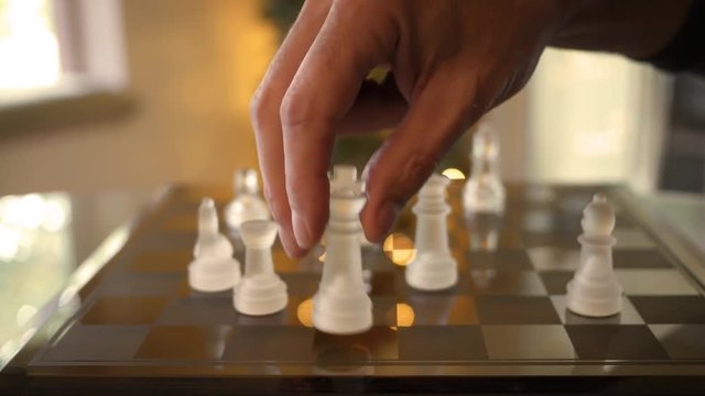 Camera pans over cinematic chess match with bokeh - ALT