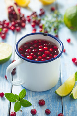 cranberry drink on wooden surface