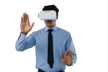 Businessman wearing vr glasses while using invisible interface