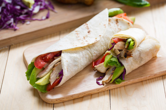tortilla wrap with grilled chicken,avocado,tomato and lettuce