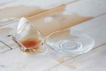 Drop cup tea by accident.