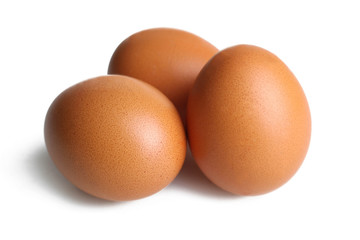 Three brown eggs