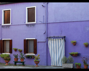 Colorful small, brightly painted houses on the island of Burano, Venice, Italy