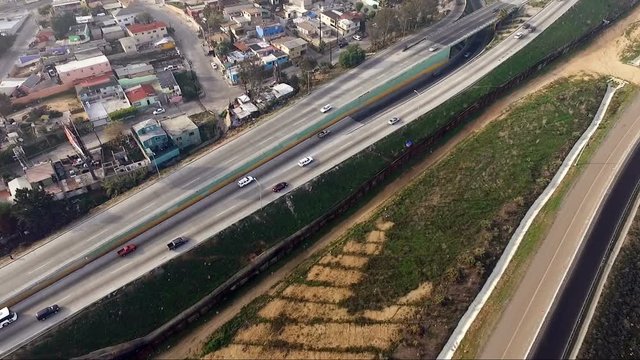 Aerial View Pan Up Fence Highway Border Mexico Tijuana