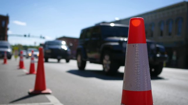 Construction cones blocking a parking spot in small american town