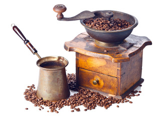 Old coffee grinder, coffee maker and coffee beans