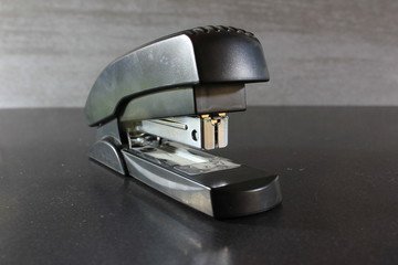 The stapler is used in the office to manually connect paper