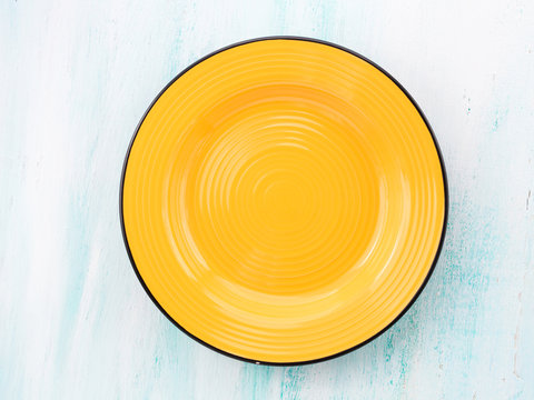 Pastel Color Yellow Ceramic Plate Dish Top View Background