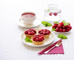Mini tarts with raspberries fruits
