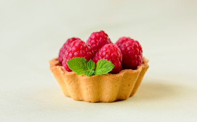 Mini tarts with raspberries fruits