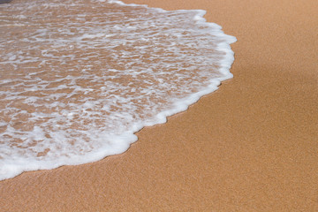 Sand beach and wave