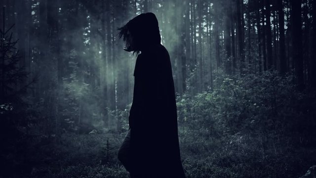 4K Halloween Horror Man with Pig Mask Walking in Forest